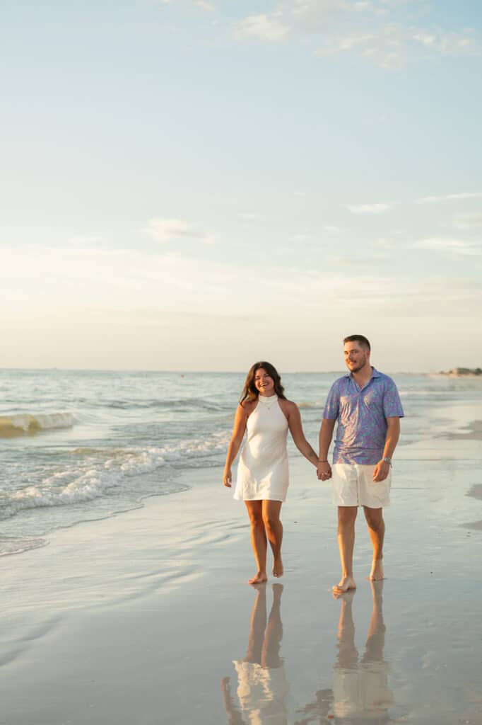 Clearwater Beach Proposal - Mason and Emillie - Joyelan Photography - couple walking