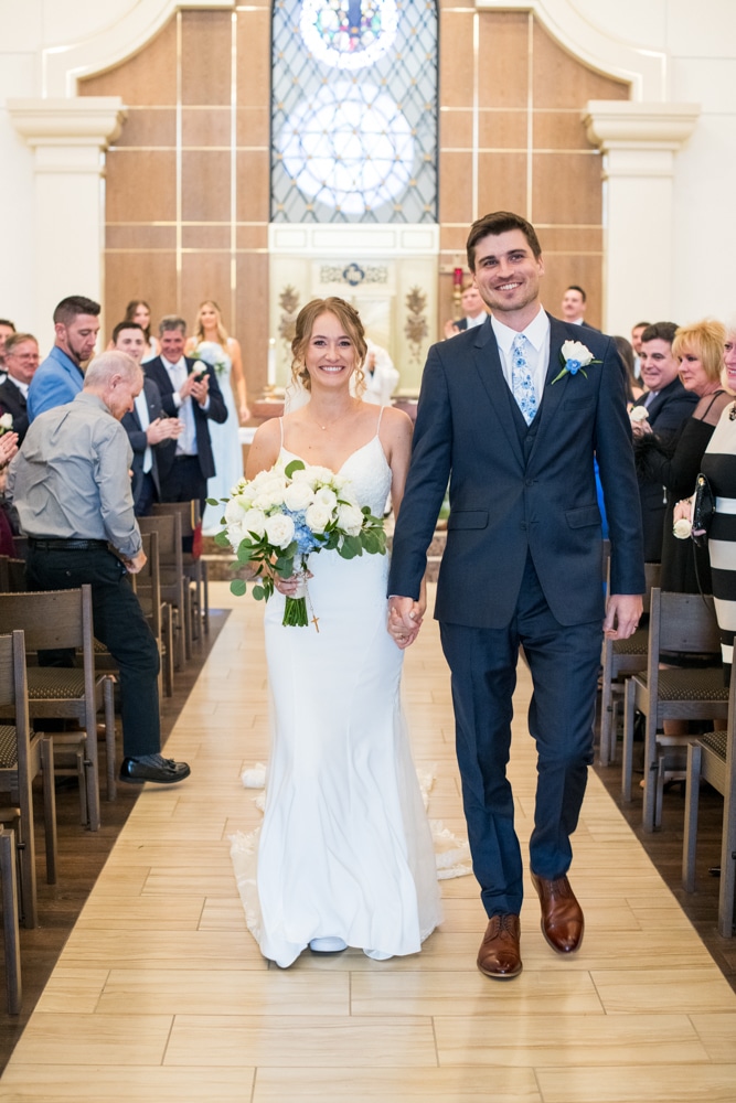 Bride and Groom Walk down Aisle